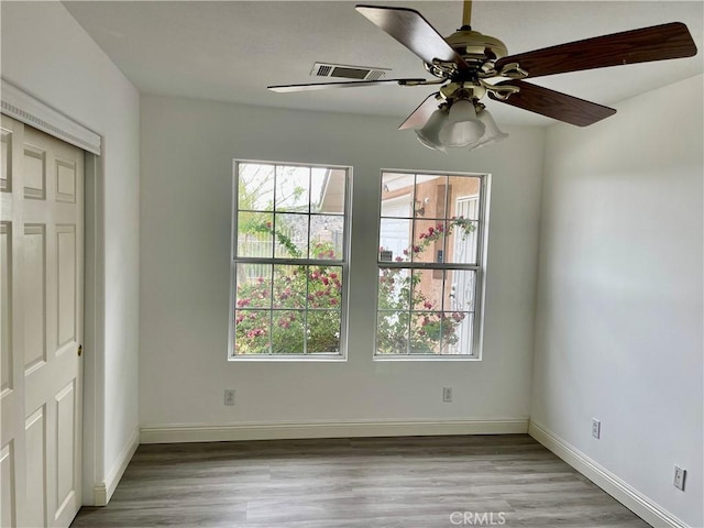 48628 Adeline Way, Morongo Valley, CA 92256 - spare room with ceiling fan, baseboards, visible vents, and wood finished floors
