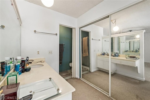 1620 S Cypress Ave, Ontario, CA 91762 - full bathroom featuring double vanity and a textured ceiling