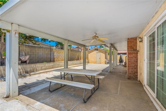 1620 S Cypress Ave, Ontario, CA 91762 - fenced backyard featuring a storage shed, a patio area, ceiling fan, and outdoor dining space