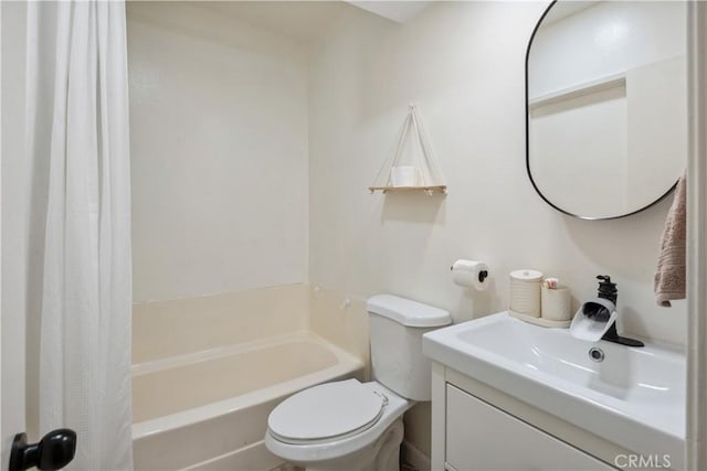 full bathroom featuring toilet, shower / bath combination with curtain, and vanity