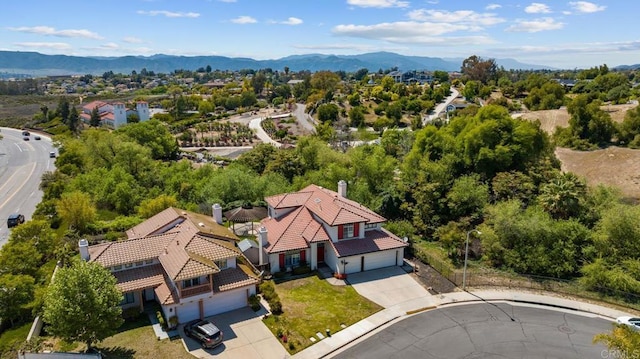 bird's eye view featuring a residential view and a mountain view