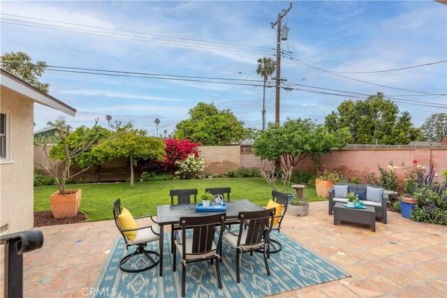 view of patio with outdoor dining area and an outdoor living space