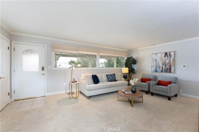living area featuring carpet floors, crown molding, and baseboards
