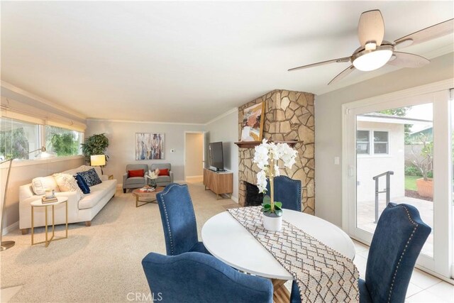 dining space featuring ceiling fan, ornamental molding, and baseboards