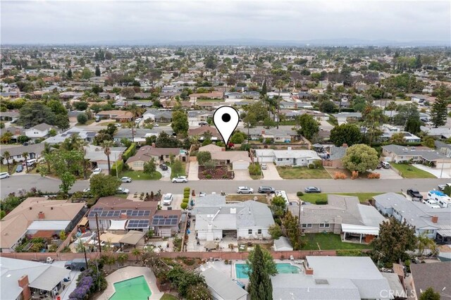 aerial view of residential area featuring a pool area
