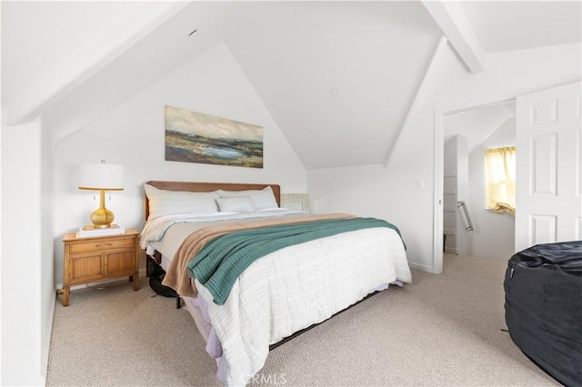 bedroom featuring lofted ceiling with beams and carpet flooring