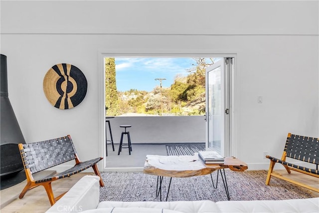 living room with plenty of natural light and baseboards