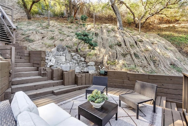 deck featuring outdoor lounge area