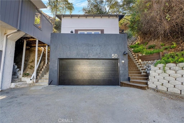 garage with driveway