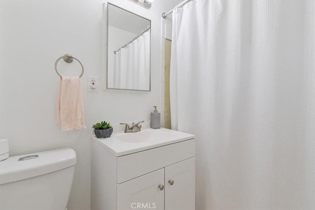 44650 2nd St E, Lancaster, CA 93535 - bathroom with vanity, toilet, and curtained shower
