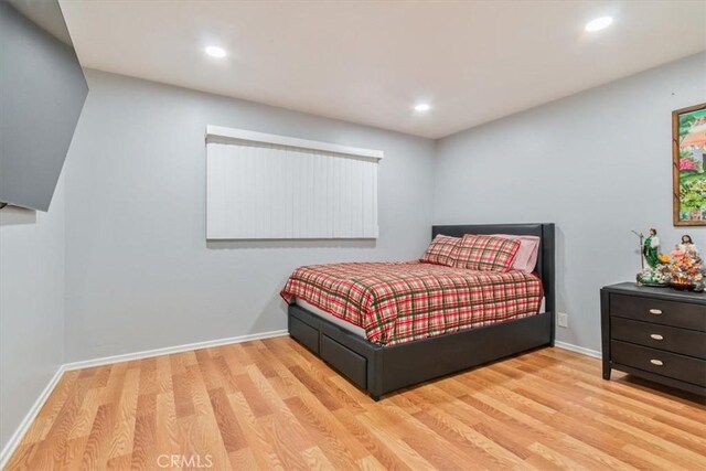 44650 2nd St E, Lancaster, CA 93535 - bedroom featuring wood finished floors, baseboards, and recessed lighting