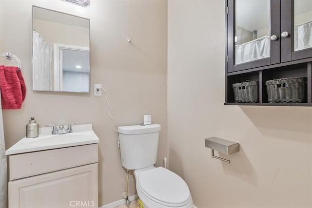 44650 2nd St E, Lancaster, CA 93535 - full bathroom with toilet, vanity, and baseboards