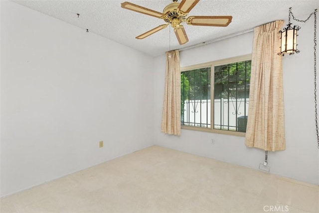 2797 Persimmon Pl, Riverside, CA 92506 - carpeted empty room with a textured ceiling and ceiling fan