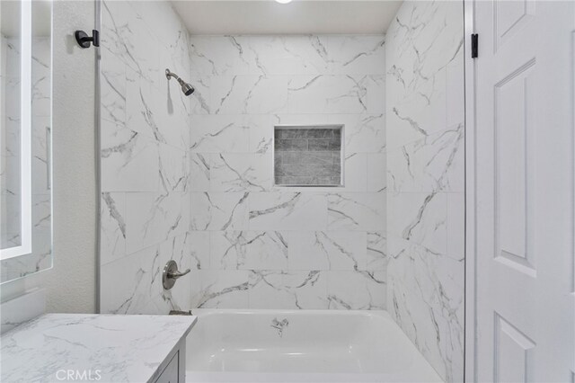 full bath with vanity and washtub / shower combination