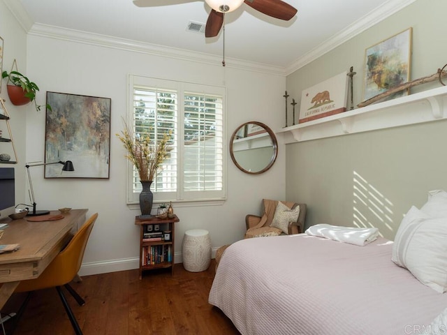 bedroom with crown molding, visible vents, wood finished floors, baseboards, and ceiling fan