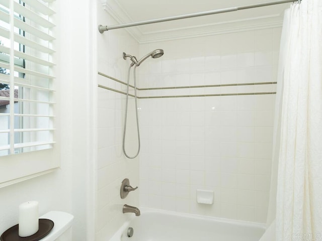 bathroom with toilet, shower / bathtub combination with curtain, and ornamental molding