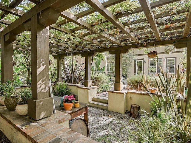 view of patio featuring a pergola