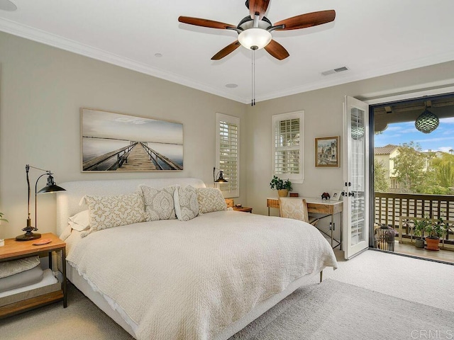 carpeted bedroom with a ceiling fan, visible vents, access to exterior, and ornamental molding