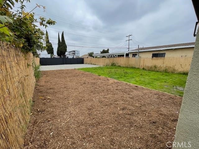 view of yard with fence