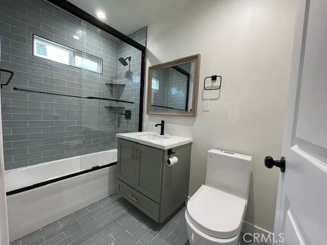 1539 E 87th St, Los Angeles, CA 90002 - bathroom with shower / bath combination with glass door, toilet, vanity, and tile patterned floors