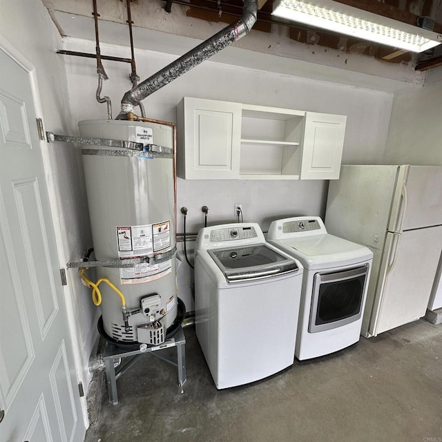 laundry room featuring cabinet space, independent washer and dryer, and secured water heater