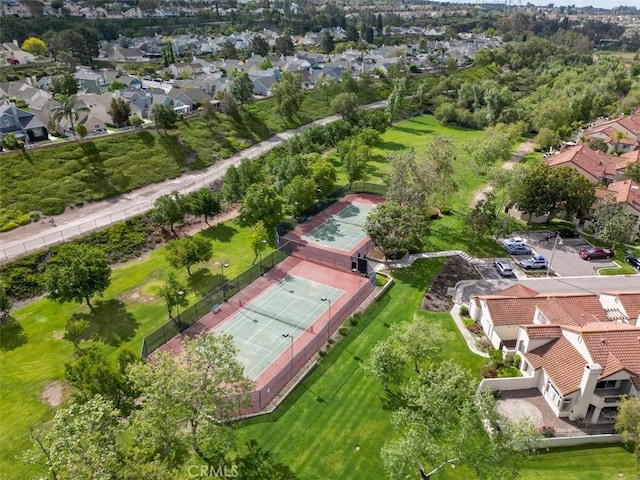 birds eye view of property with a residential view