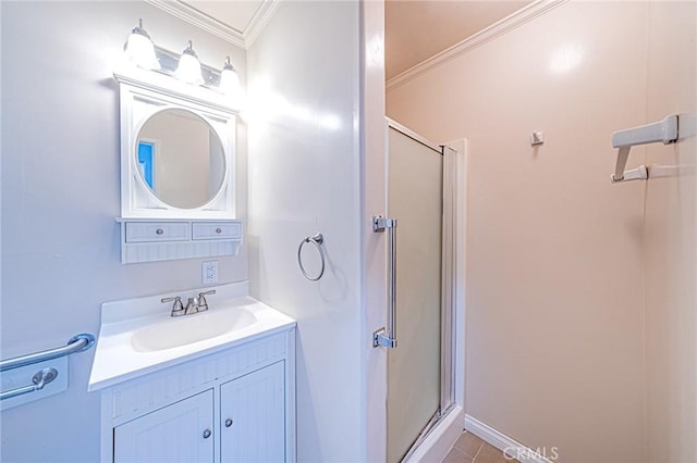 bathroom with crown molding, vanity, and a stall shower