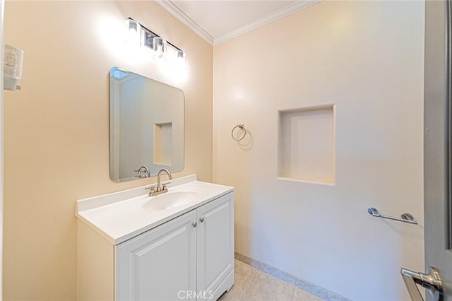 bathroom featuring crown molding, baseboards, tile patterned floors, and vanity