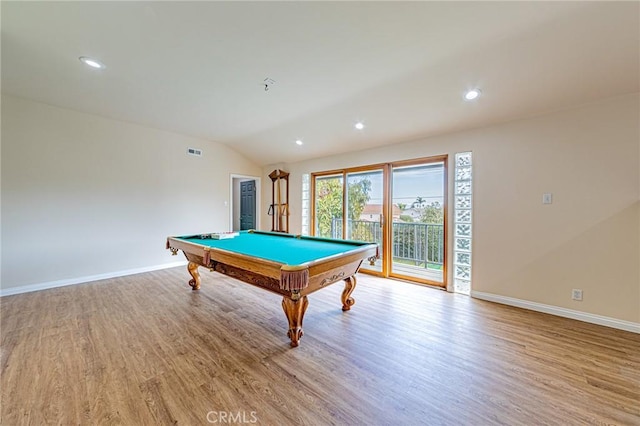 recreation room with pool table, baseboards, vaulted ceiling, and light wood-style flooring