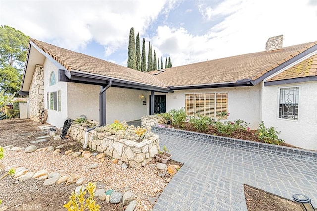 single story home with stucco siding