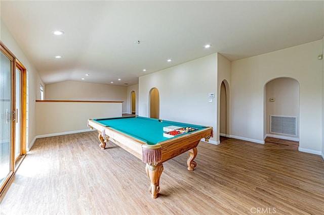 playroom with visible vents, baseboards, pool table, arched walkways, and light wood-style flooring