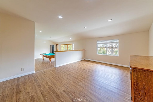 unfurnished living room featuring light wood-style floors, billiards, baseboards, and recessed lighting