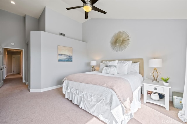 carpeted bedroom featuring visible vents, a ceiling fan, baseboards, and high vaulted ceiling