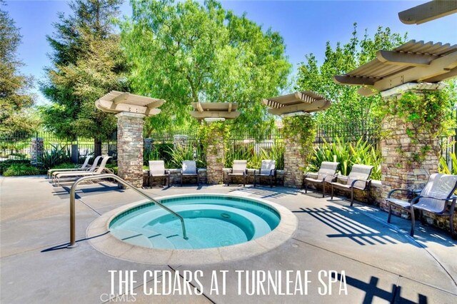 473 Periwinkle St, Fullerton, CA 92835 - view of pool with fence, a patio area, and a community hot tub