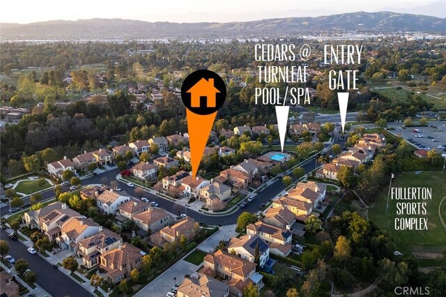 473 Periwinkle St, Fullerton, CA 92835 - view of property location with mountains and nearby suburban area