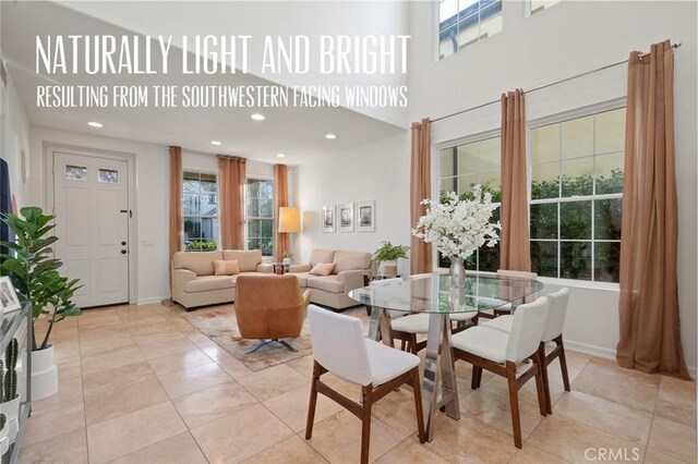 473 Periwinkle St, Fullerton, CA 92835 - dining area with baseboards, recessed lighting, a high ceiling, and light tile patterned floors