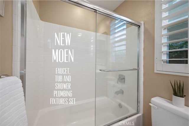 473 Periwinkle St, Fullerton, CA 92835 - bathroom featuring toilet and bath / shower combo with glass door