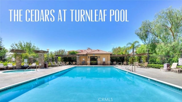 473 Periwinkle St, Fullerton, CA 92835 - community pool featuring a patio area and fence