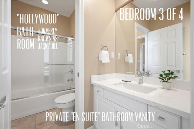 473 Periwinkle St, Fullerton, CA 92835 - full bath with tile patterned floors, vanity, toilet, and combined bath / shower with glass door