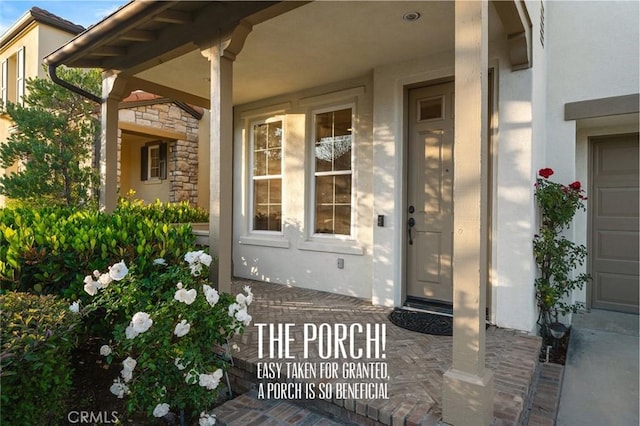 473 Periwinkle St, Fullerton, CA 92835 - entrance to property featuring a porch, stucco siding, and stone siding