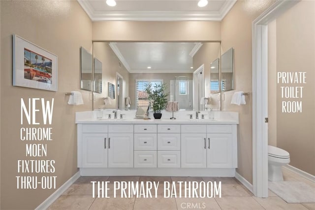 473 Periwinkle St, Fullerton, CA 92835 - full bathroom with ornamental molding, double vanity, baseboards, toilet, and tile patterned floors