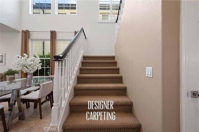 473 Periwinkle St, Fullerton, CA 92835 - stairway with healthy amount of natural light and tile patterned flooring