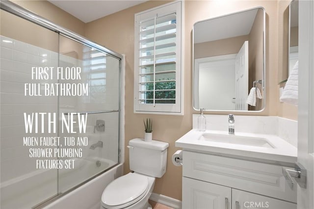 473 Periwinkle St, Fullerton, CA 92835 - full bathroom featuring bath / shower combo with glass door, vanity, toilet, and baseboards