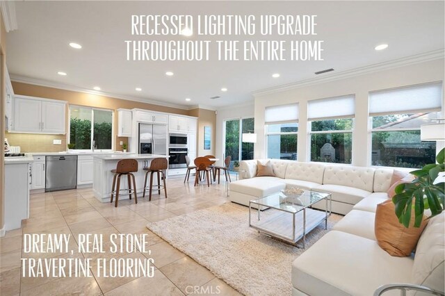473 Periwinkle St, Fullerton, CA 92835 - living room with crown molding, recessed lighting, and light tile patterned flooring