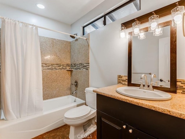 full bathroom featuring vanity, toilet, and shower / tub combo