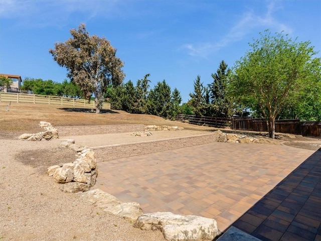 exterior space with a patio area and fence