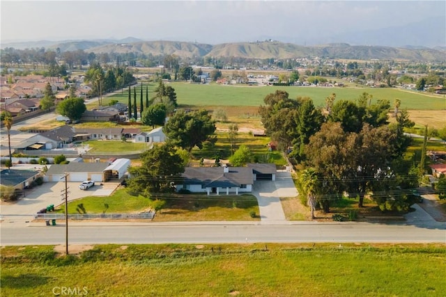 drone / aerial view featuring a mountain view