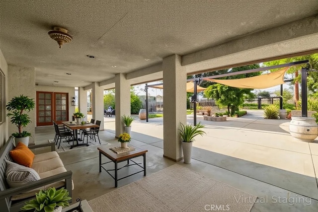 2485 W Westward Ave, Banning, CA 92220 - view of patio with french doors, a pergola, and outdoor dining space