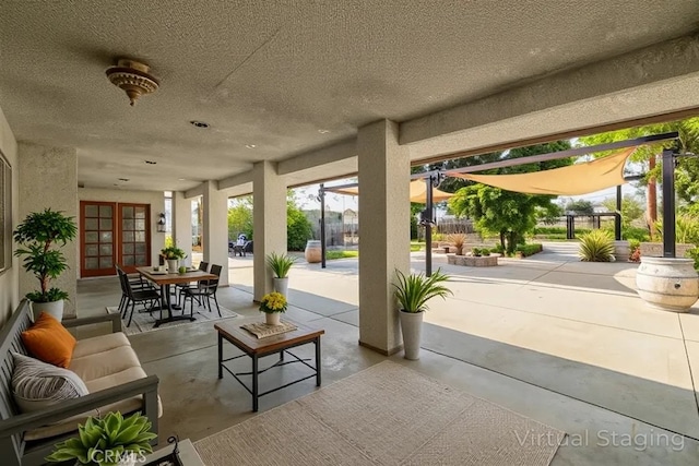 2485 W Westward Ave, Banning, CA 92220 - view of patio / terrace with french doors, a pergola, and outdoor dining area
