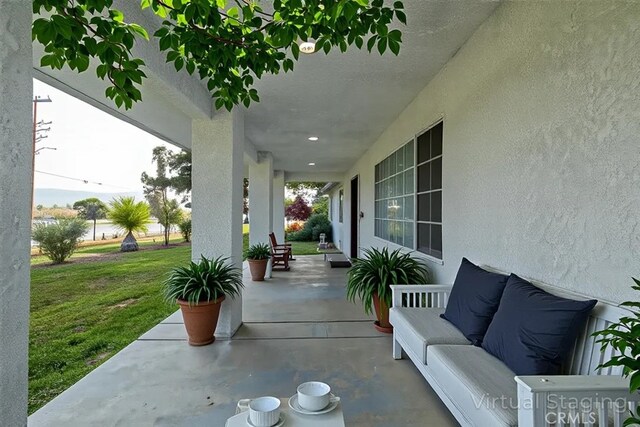 2485 W Westward Ave, Banning, CA 92220 - view of patio / terrace featuring a porch
